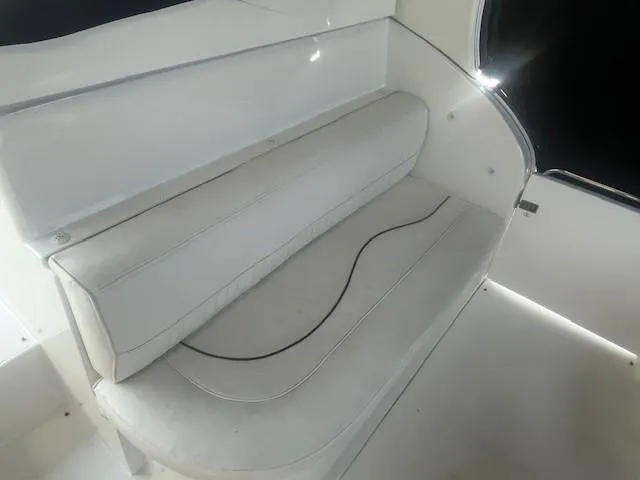  Yacht Photos Pics White seating area on a 2000 Cruisers Yachts 4450 Express Motoryacht.