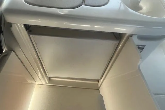  Yacht Photos Pics Interior view of 2000 Cruisers Yachts 4450 Express Motoryacht, featuring a compact storage area.