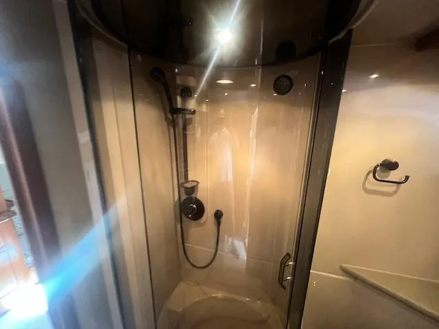  Yacht Photos Pics Shower area in 2000 Cruisers Yachts 4450 Express Motoryacht, featuring modern fixtures.