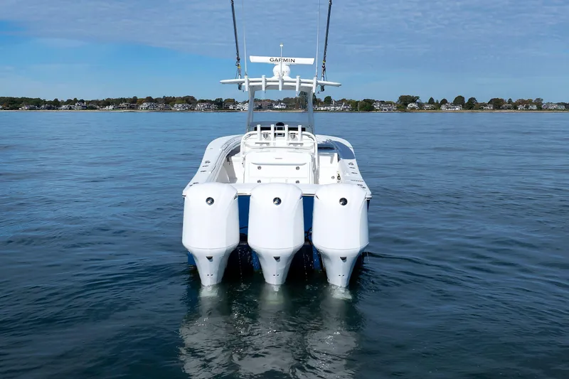 34 Ss Yacht Photos Pics 2018 Regulator 34SS boat with triple engines on calm water.