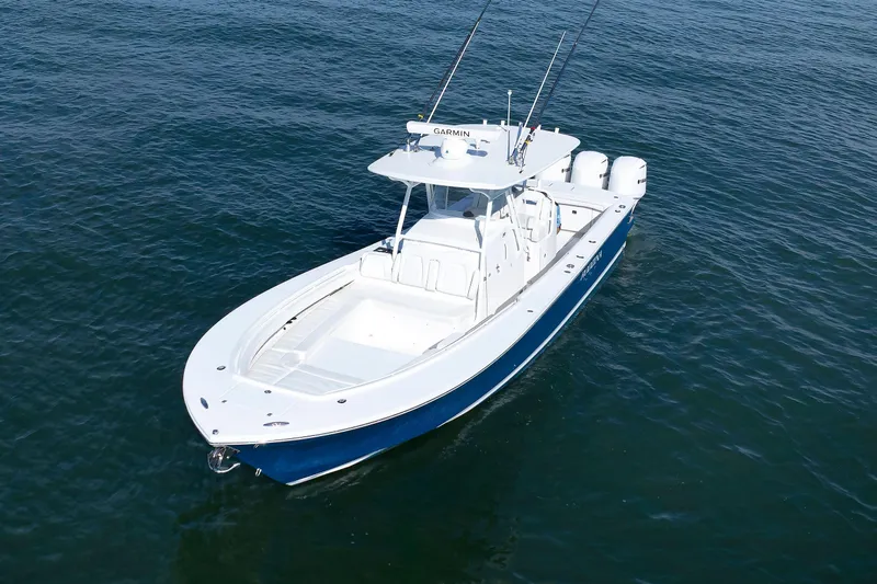 34 Ss Yacht Photos Pics 2018 Regulator 34SS boat on open water, featuring sleek design and powerful engines.