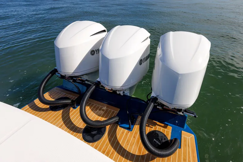 34 Ss Yacht Photos Pics 2018 Regulator 34SS boat with triple Yamaha outboard engines on water.