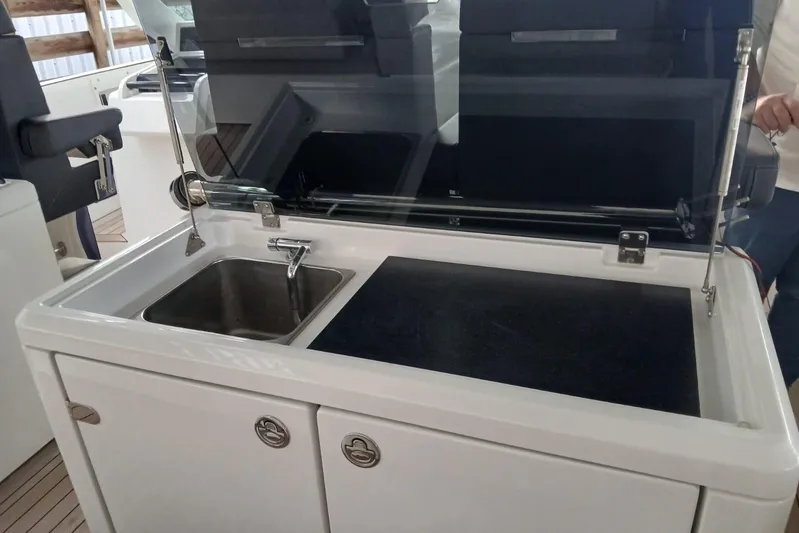 Fjord 41 Xl Yacht Photos Pics Fjord 41 XL 2021 yacht kitchenette with sink and countertop.