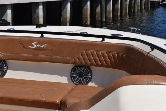 Way Out Yacht Photos Pics 2023 Scout 377 LXF boat with luxurious brown leather seating.