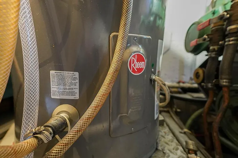 Sunshine Yacht Photos Pics Rheem water heater in 1986 Marine Trader Tradewinds 47 engine room.