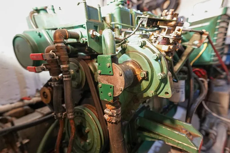 Sunshine Yacht Photos Pics Engine of 1986 Marine Trader Tradewinds 47 boat, showcasing mechanical components.