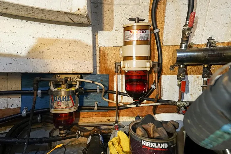 Sunshine Yacht Photos Pics Fuel filters in the engine room of a 1986 Marine Trader Tradewinds 47 yacht.