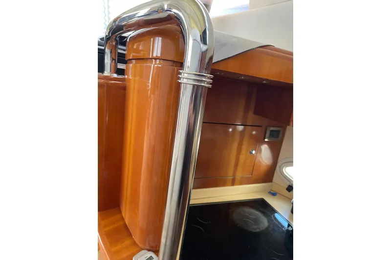 Offshore Flyer Yacht Photos Pics Interior of 2000 Azimut 46 Flybridge MY yacht with polished wood and chrome details.