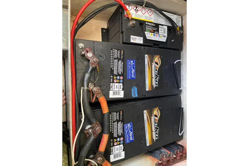 Offshore Flyer Yacht Photos Pics Battery setup in a 2000 Azimut 46 Flybridge MY yacht engine compartment.