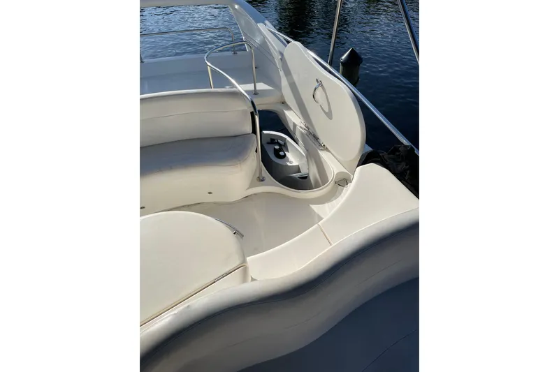 Offshore Flyer Yacht Photos Pics 2000 Azimut 46 Flybridge MY yacht interior with open storage compartment.