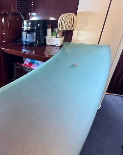  Yacht Photos Pics Interior of 2004 Princess V65 yacht with kitchen counter and appliances.