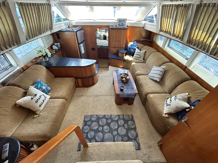 Carolina Breeze Yacht Photos Pics Luxurious interior of 2002 Carver 444 Cockpit Motor Yacht with plush seating and modern amenities.