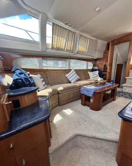 Carolina Breeze Yacht Photos Pics Interior of 2002 Carver 444 Cockpit Motor Yacht with cozy seating area.