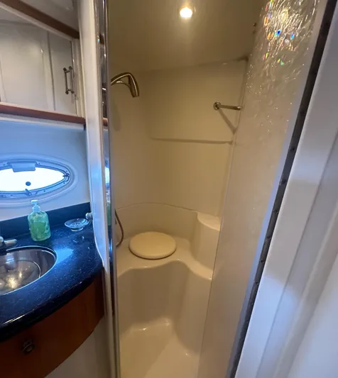 Carolina Breeze Yacht Photos Pics 2002 Carver 444 Cockpit Motor Yacht bathroom with shower and sink.