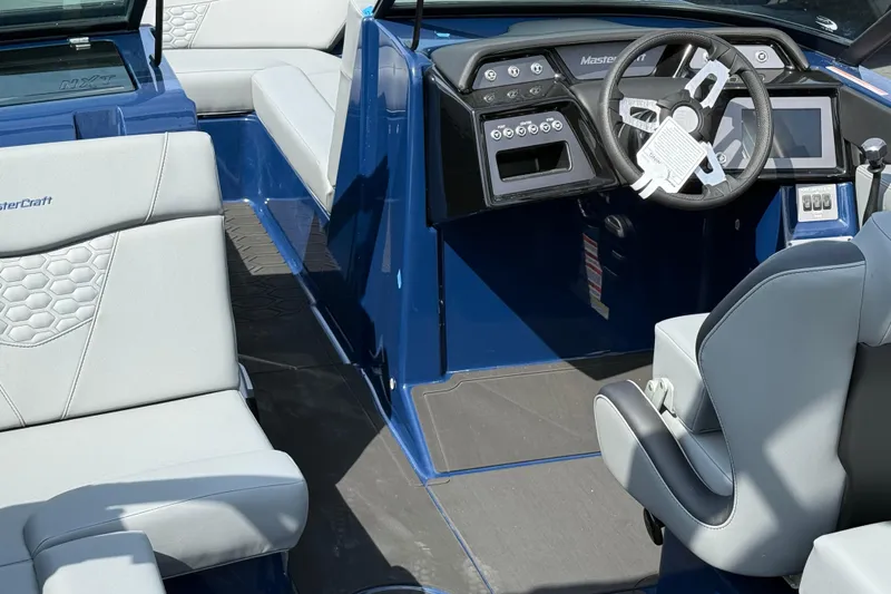  Yacht Photos Pics 2026 MasterCraft NXT24 boat interior with modern dashboard and comfortable seating.