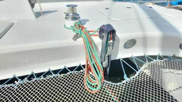 Fat Cat Yacht Photos Pics Sailboat deck with colorful ropes and netting, Custom Morelli-Miller model, 1991.