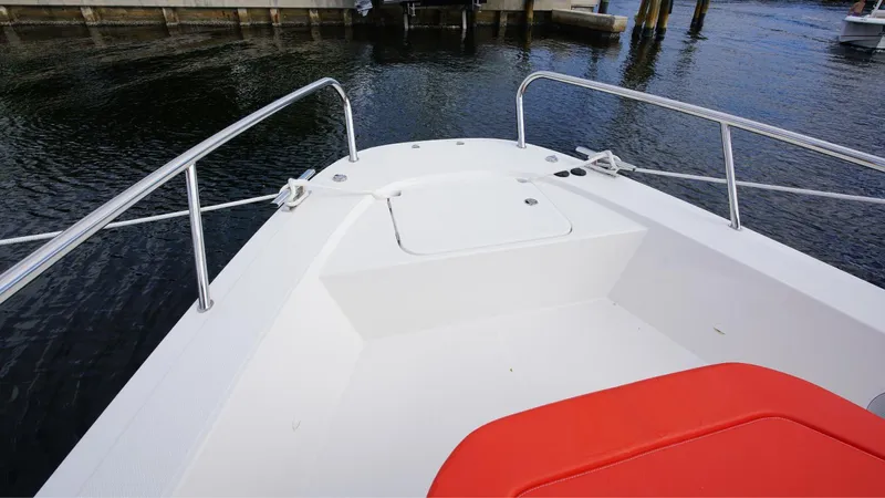 In-stock 2024 Nimbus T11 #260 Yacht Photos Pics Bow view of 2024 Nimbus Tender 11 #260, featuring sleek design and vibrant seating.