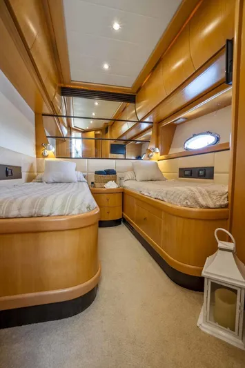 Denise Yacht Photos Pics Luxurious twin cabin interior of 2005 Pershing 76 Motor Yacht with wooden finishes.