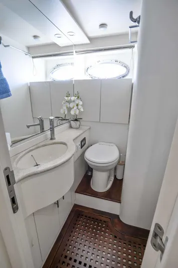 Denise Yacht Photos Pics 2005 Pershing 76 Motor Yacht bathroom with modern fixtures and elegant design.