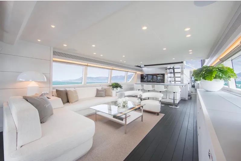 Nicostasia Yacht Photos Pics Luxurious interior of 2018 Van der Valk Raised Pilothouse 26m yacht, featuring elegant white furnishings.
