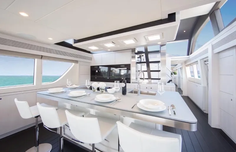 Nicostasia Yacht Photos Pics Luxurious interior of 2018 Van der Valk Raised Pilothouse 26m yacht with modern dining area.