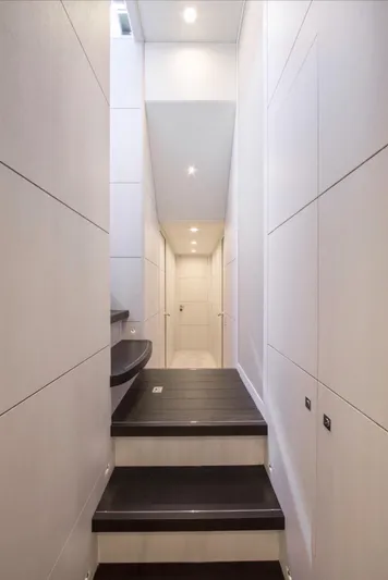 Nicostasia Yacht Photos Pics Interior hallway of 2018 Van der Valk Raised Pilothouse 26m yacht, featuring modern design and lighting.