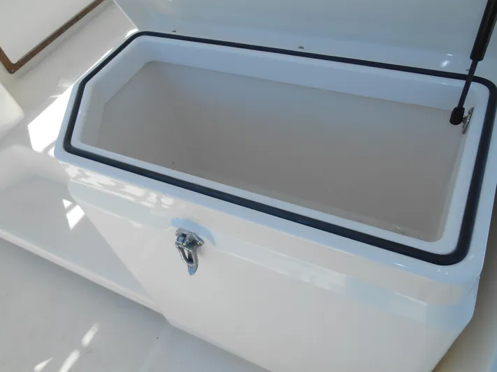 Mistress Yacht Photos Pics Open storage compartment on a 1998 Cabo 31 Express boat.