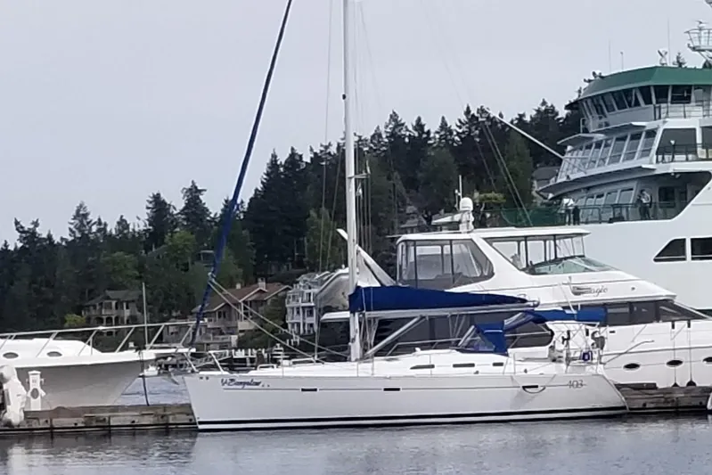 H2o Bungalow Yacht Photos Pics 2006 Beneteau Oceanis 393 sailboat docked at marina with other vessels.