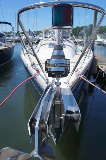 Midnight Yacht Photos Pics 2005 Sabre 386 sailboat docked, featuring anchor and Furlex system.