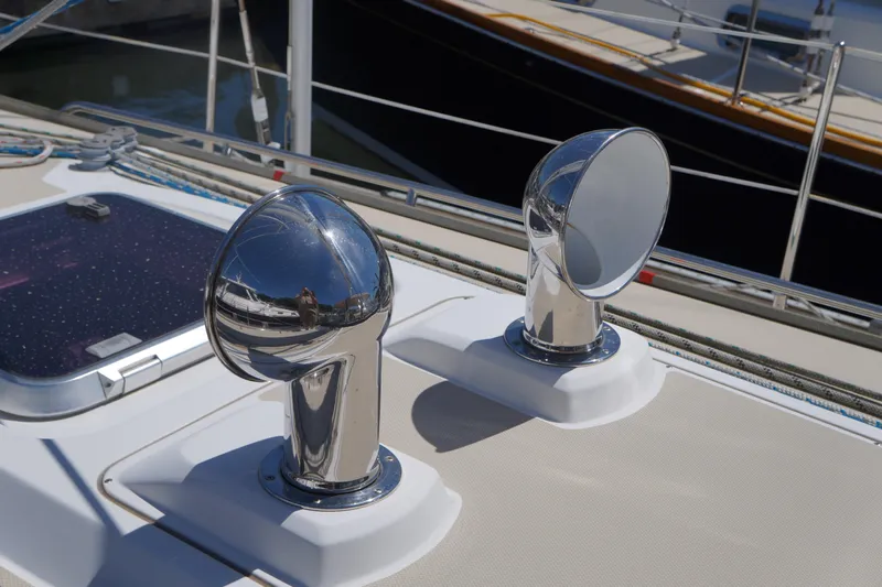 Midnight Yacht Photos Pics Deck of 2005 Sabre 386 yacht with chrome vents and hatch.