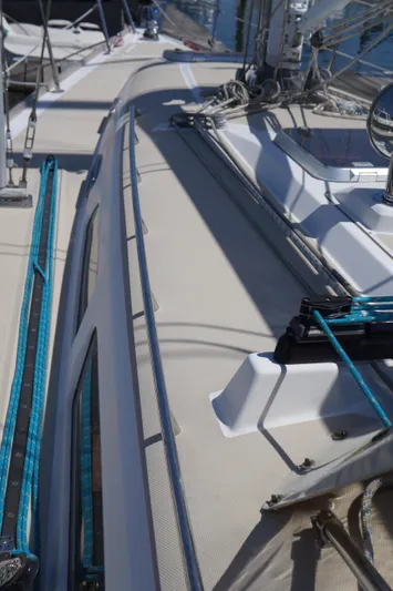 Midnight Yacht Photos Pics 2005 Sabre 386 sailboat deck with rigging and blue lines.