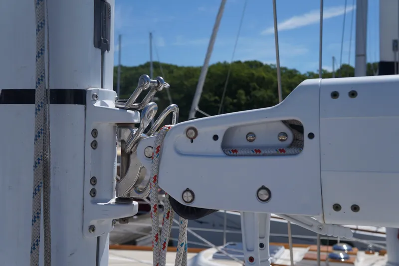 Midnight Yacht Photos Pics Close-up of a Sabre 386 sailboat rigging system, 2005 model, with clear blue sky.
