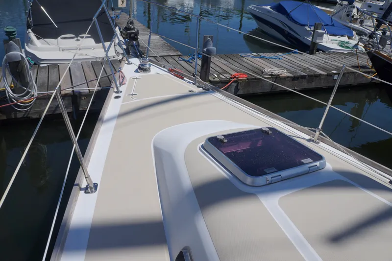 Midnight Yacht Photos Pics Deck of a 2005 Sabre 386 sailboat docked at a marina.