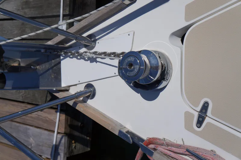 Midnight Yacht Photos Pics Deck of 2005 Sabre 386 sailboat with anchor windlass and chain.