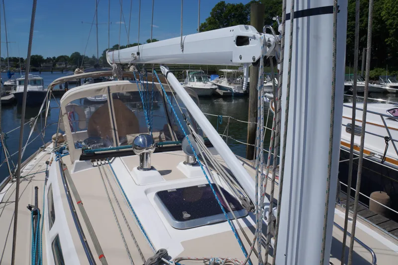 Midnight Yacht Photos Pics 2005 Sabre 386 sailboat docked at marina, featuring deck and rigging details.
