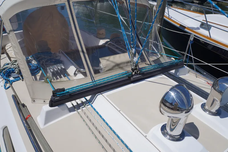 Midnight Yacht Photos Pics 2005 Sabre 386 sailboat deck with ropes and winches in marina.