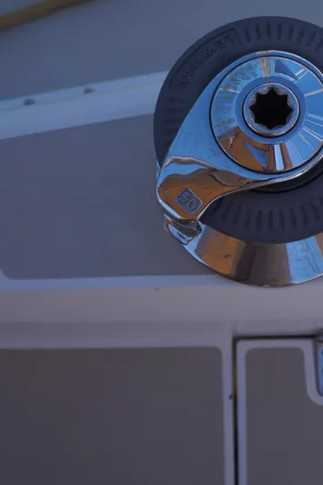 Midnight Yacht Photos Pics Close-up of a winch on a 2005 Sabre 386 sailboat deck.