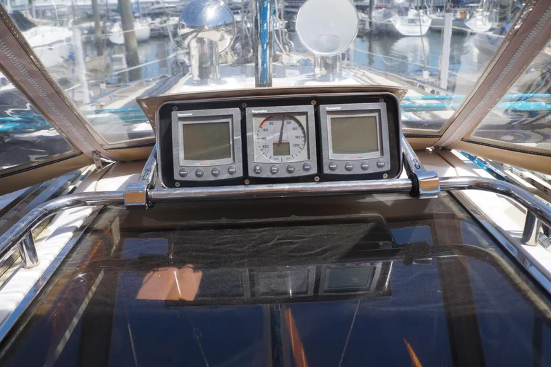 Midnight Yacht Photos Pics Control panel of a 2005 Sabre 386 yacht with navigation instruments.