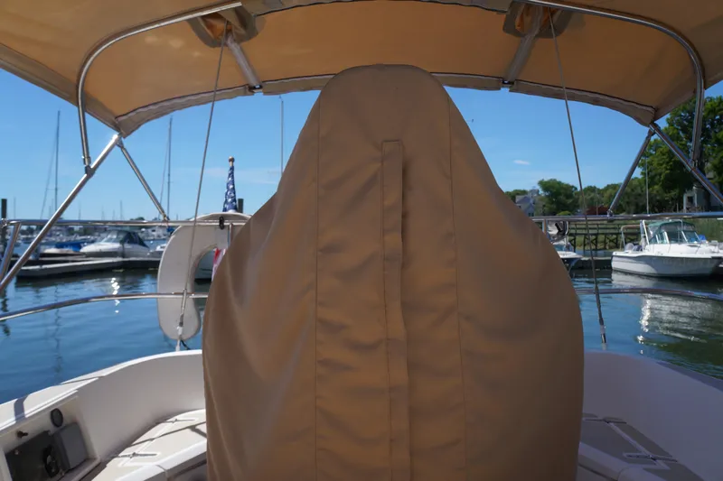 Midnight Yacht Photos Pics Covered helm of a 2005 Sabre 386 sailboat docked at a marina.