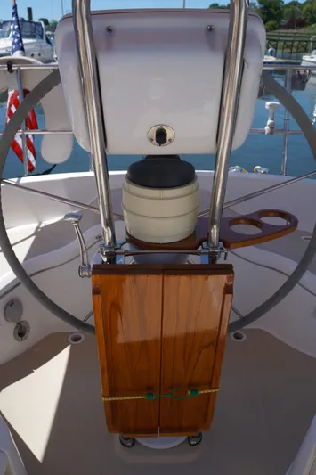 Midnight Yacht Photos Pics Sailboat helm of 2005 Sabre 386 with wooden details and steering wheel.