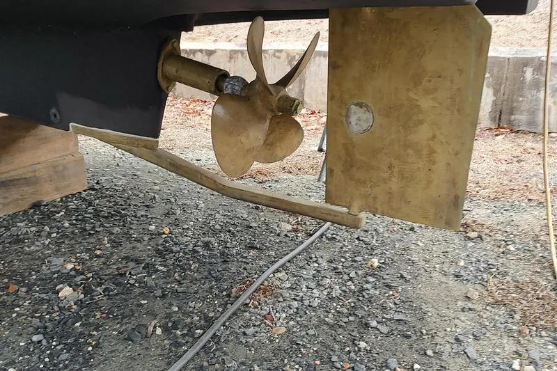 "rosebud" Yacht Photos Pics Propeller and rudder of 2003 Mainship 34 PILOT boat on dry land.