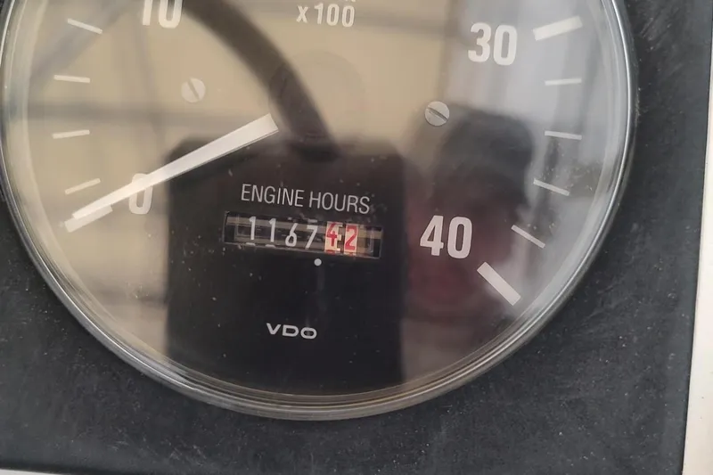 "rosebud" Yacht Photos Pics Close-up of a VDO engine hour meter showing 1167.42 hours on a 2003 Mainship 34 PILOT.