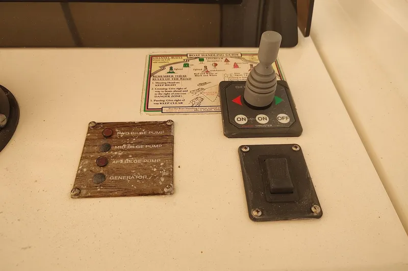 "rosebud" Yacht Photos Pics Control panel of a 2003 Mainship 34 PILOT boat with bilge pump switches.