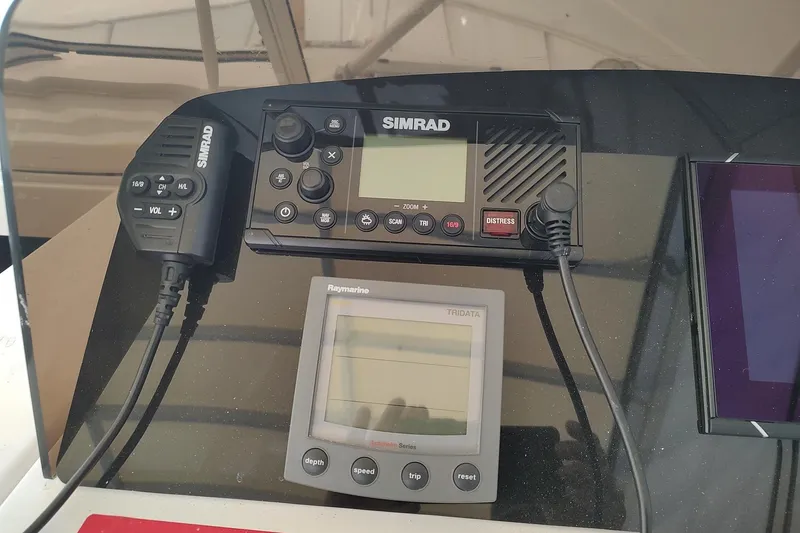 "rosebud" Yacht Photos Pics Simrad and Raymarine navigation equipment on 2003 Mainship 34 Pilot boat dashboard.