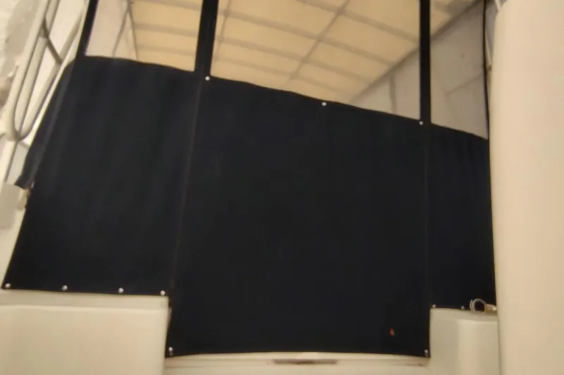 "rosebud" Yacht Photos Pics 2003 Mainship 34 PILOT boat interior with dark canvas enclosure.