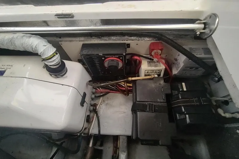"rosebud" Yacht Photos Pics Engine compartment of 2003 Mainship 34 PILOT with battery switch and wiring.