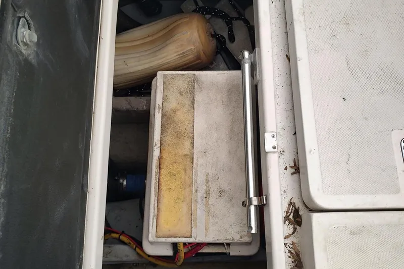 "rosebud" Yacht Photos Pics Storage compartment of a 2003 Mainship 34 PILOT boat, showing equipment and accessories.