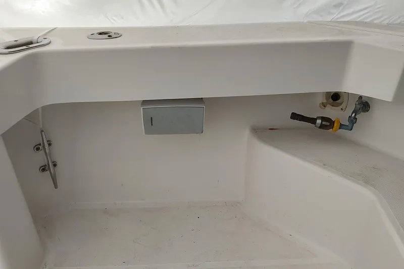 "rosebud" Yacht Photos Pics 2003 Mainship 34 PILOT boat interior detail with storage and fittings.