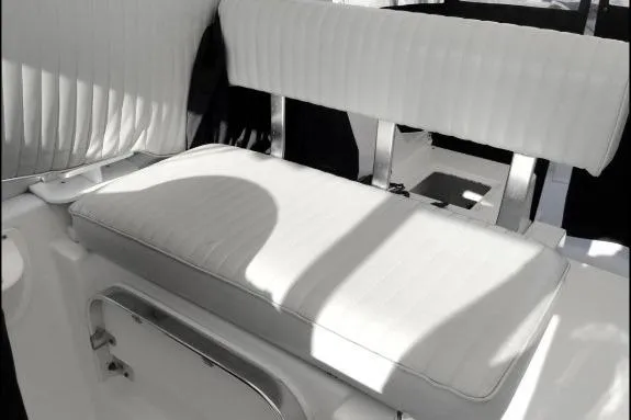 "rosebud" Yacht Photos Pics 2003 Mainship 34 PILOT boat interior with white cushioned seating and sleek design.