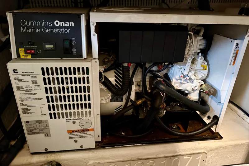 La Dolce Vita Yacht Photos Pics Cummins Onan marine generator in 2011 Back Cove 37 boat engine room.